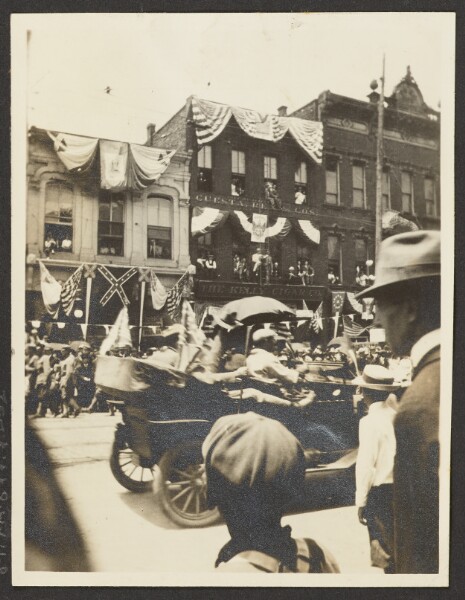 Unknown, [View of Car Driving in Parade]