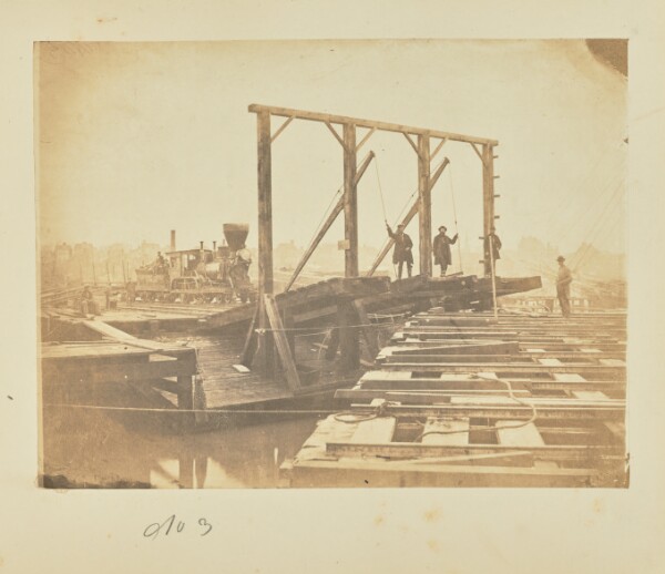 A. J. Russell, Exhibits the surface of a pair of barges showing the tracks for loading and unloading cars, also the movable bridges by which the tracks of the floats are connected with those on the wharf