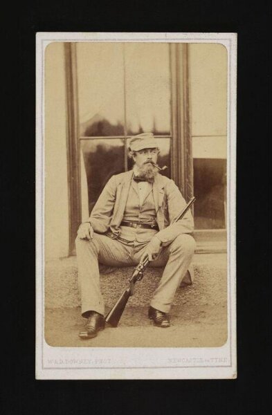 W. & D. Downey, A portrait of a man with gun