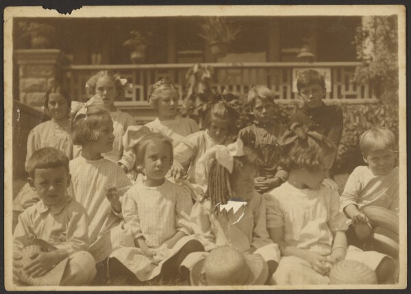 Louis Fleckenstein, [Group of Children in Front of Porch]