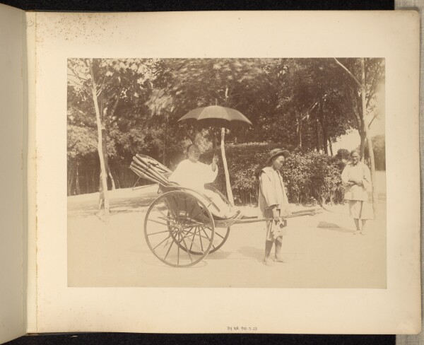 Unknown, [Rickshaw Driver and Passenger with Umbrella]
