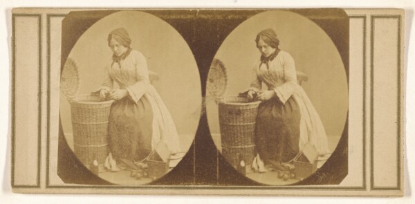 Unknown, [Woman scraping some foodstuffs into a tall basket]