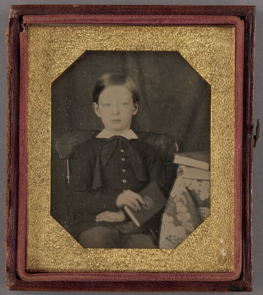 Unknown, [Portrait of a Seated Boy Holding a Book]