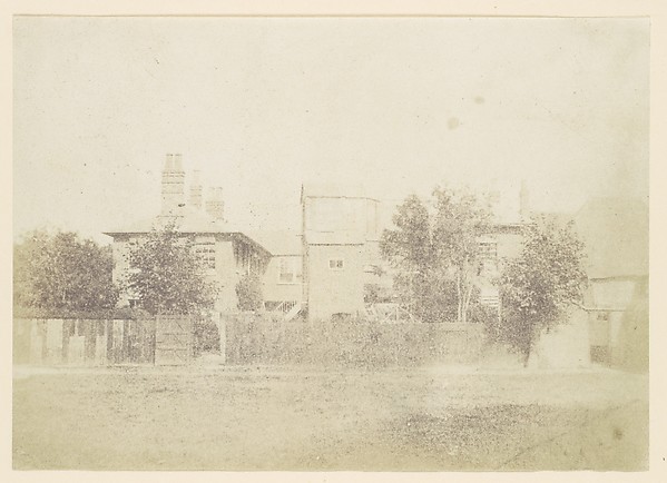 Unknown, [Compound of Buildings Surrounded By Fence]