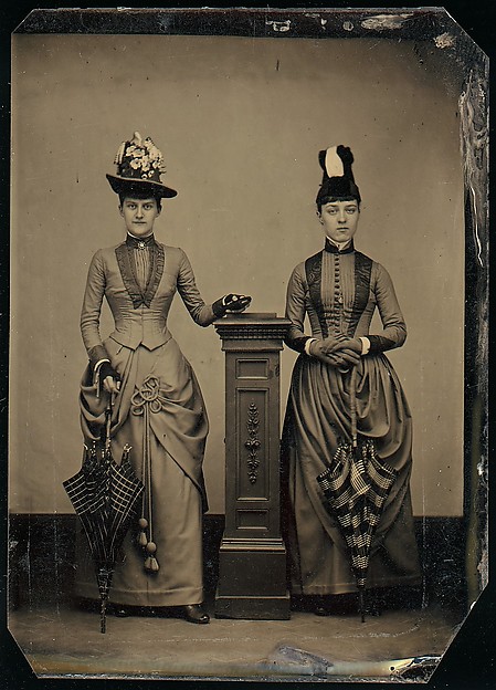 Unknown, [Studio Portrait of Two Women Holding Folded Parasols]