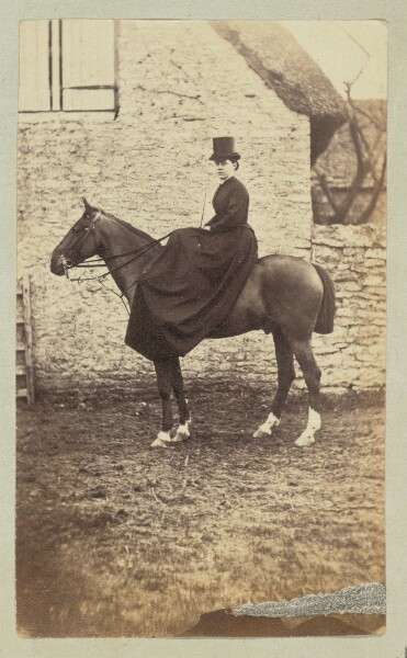 Unknown, [Equestrian portrait of a woman in a dark dress and hat]