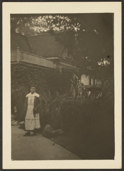 Louis Fleckenstein, [Woman in front of House]