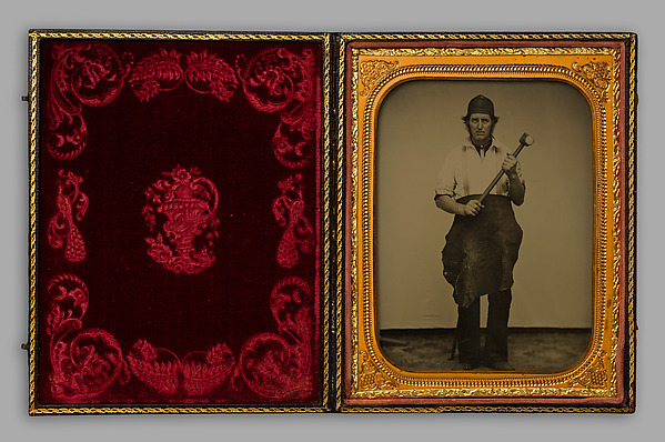 Unknown, [Man Gripping Sledgehammer, Wearing Leather Half Apron and Cap]