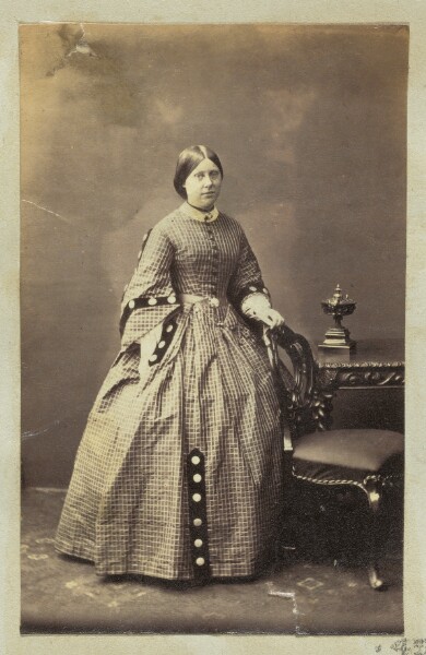 Unknown, [Portrait of woman in gingham dress]