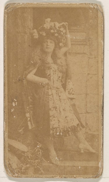 Kinney Brothers Tobacco Company, Actress wearing large floral piece in hair, from the Actresses series (N245) issued by Kinney Brothers to promote Sweet Caporal Cigarettes