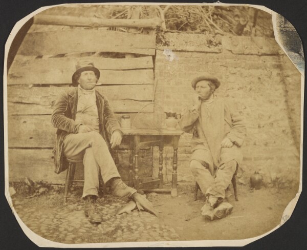 Unknown, [Two men at table]