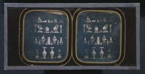Unknown, Four shelves of ceramic figures and vases
