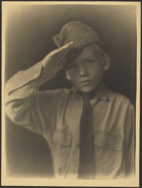 Louis Fleckenstein, [Boy Dressed as Soldier Saluting]