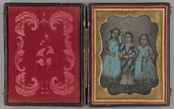 Unknown, [Portrait of Standing Two Girls and a Boy, arm-in-arm]