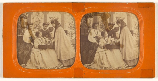 Unknown, [One woman seated examining contents of a box, other woman looking on]