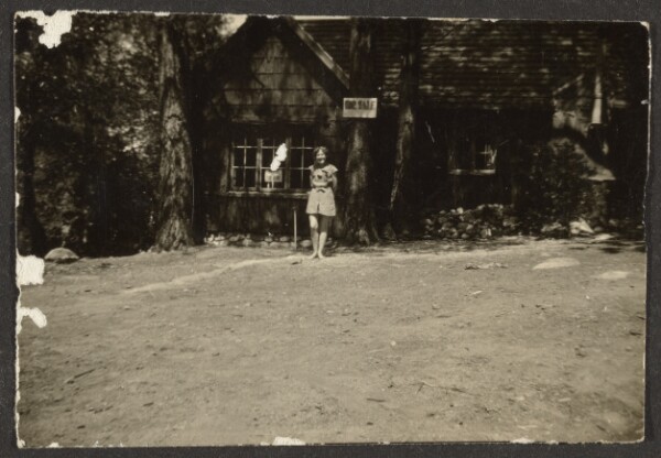 Louis Fleckenstein, [Woman before Cabin]