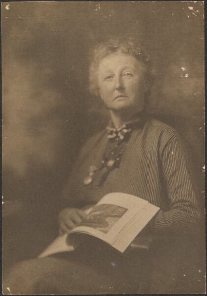 Louis Fleckenstein, [Woman Holding Magazine]