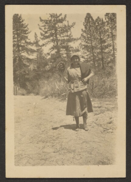 Louis Fleckenstein, [Woman Holding Large Pinecone]