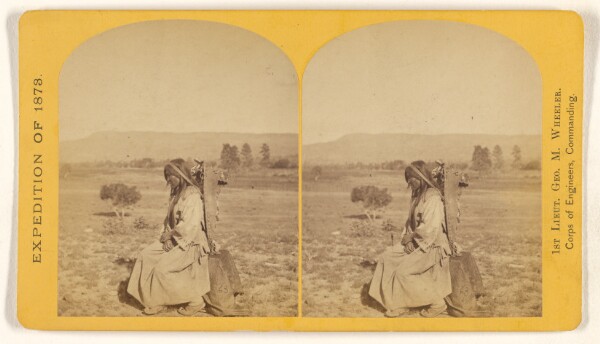 Timothy H. O'Sullivan, Apache squaw and papposse [sic]. The child is securely lashed in the wicker-work basket or box, and slung to the back of...