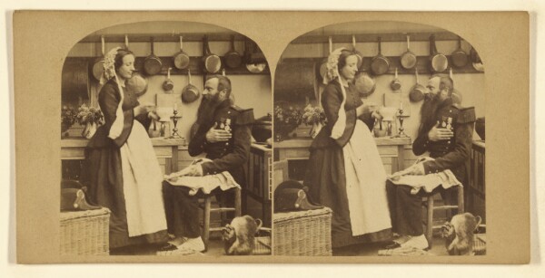 London Stereoscopic and Photographic Company, [Bearded man in military garb seated being fed soup by a woman in a kitchen]