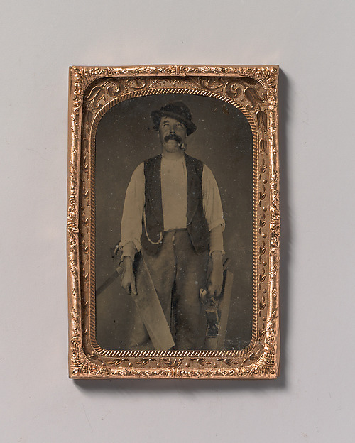 Unknown, [Carpenter with Saw, Hammer, and Jointer]
