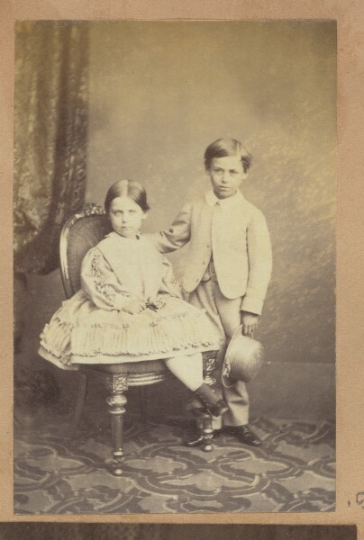 Unknown, [Portrait of two children posed with chair]