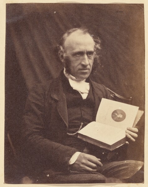 Unknown, [Portrait of Seated Man with a Book]