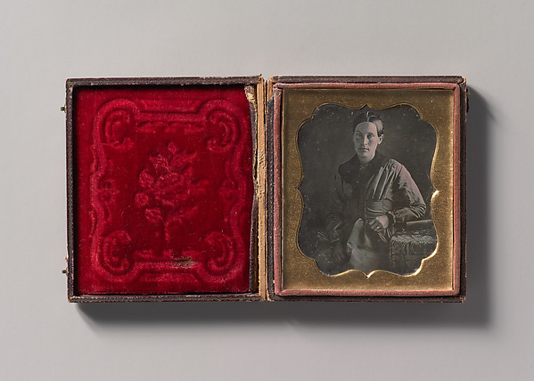Unknown, [Young Woman Seated Next to a Table with Elbow Resting on a Book]
