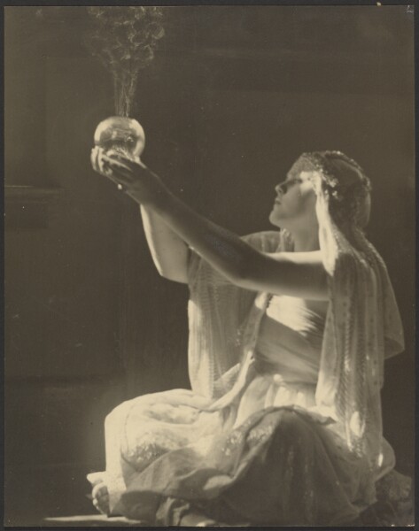Louis Fleckenstein, [Costumed Woman Holding a Glass Incense Burner]