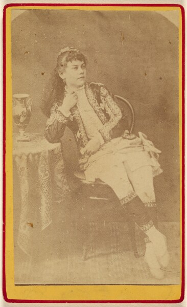 Unknown, [Unidentified young woman seated with her elbow on table]