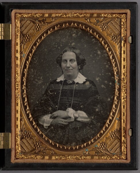 Unknown, [Portrait of a Seated Woman with Hands Crossed]