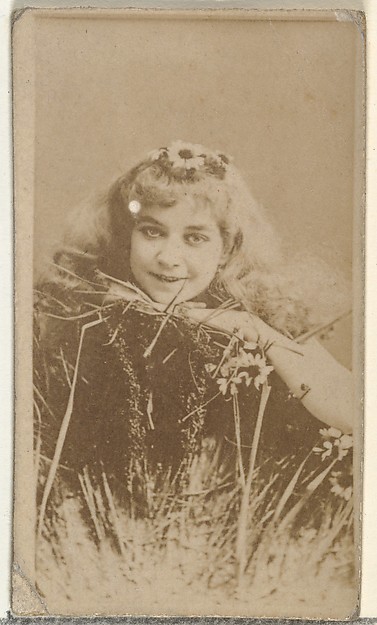 W. Duke, Sons & Co., [Actress posing in grass with daisy in hair], from the Actors and Actresses series (N145-8) issued by Duke Sons & Co. to promote Duke Cigarettes