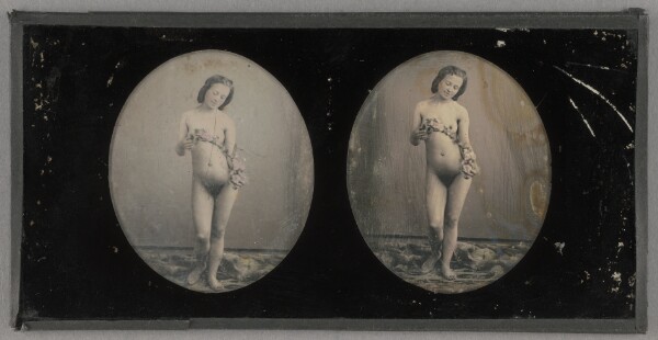 Unknown, [Female nude standing, holding a garland of flowers]