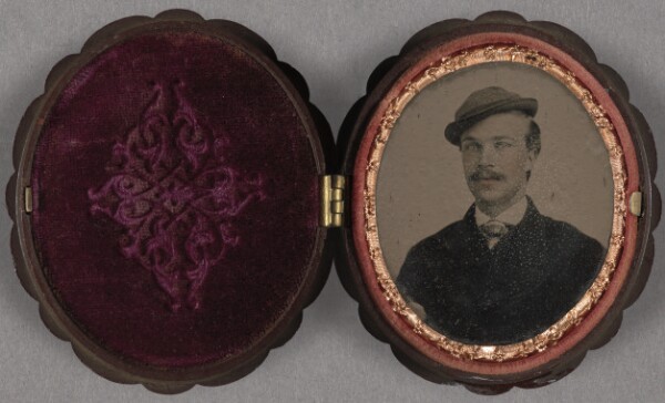 Unknown, [Portrait of a man with moustache wearing an small, ill-fitting hat]