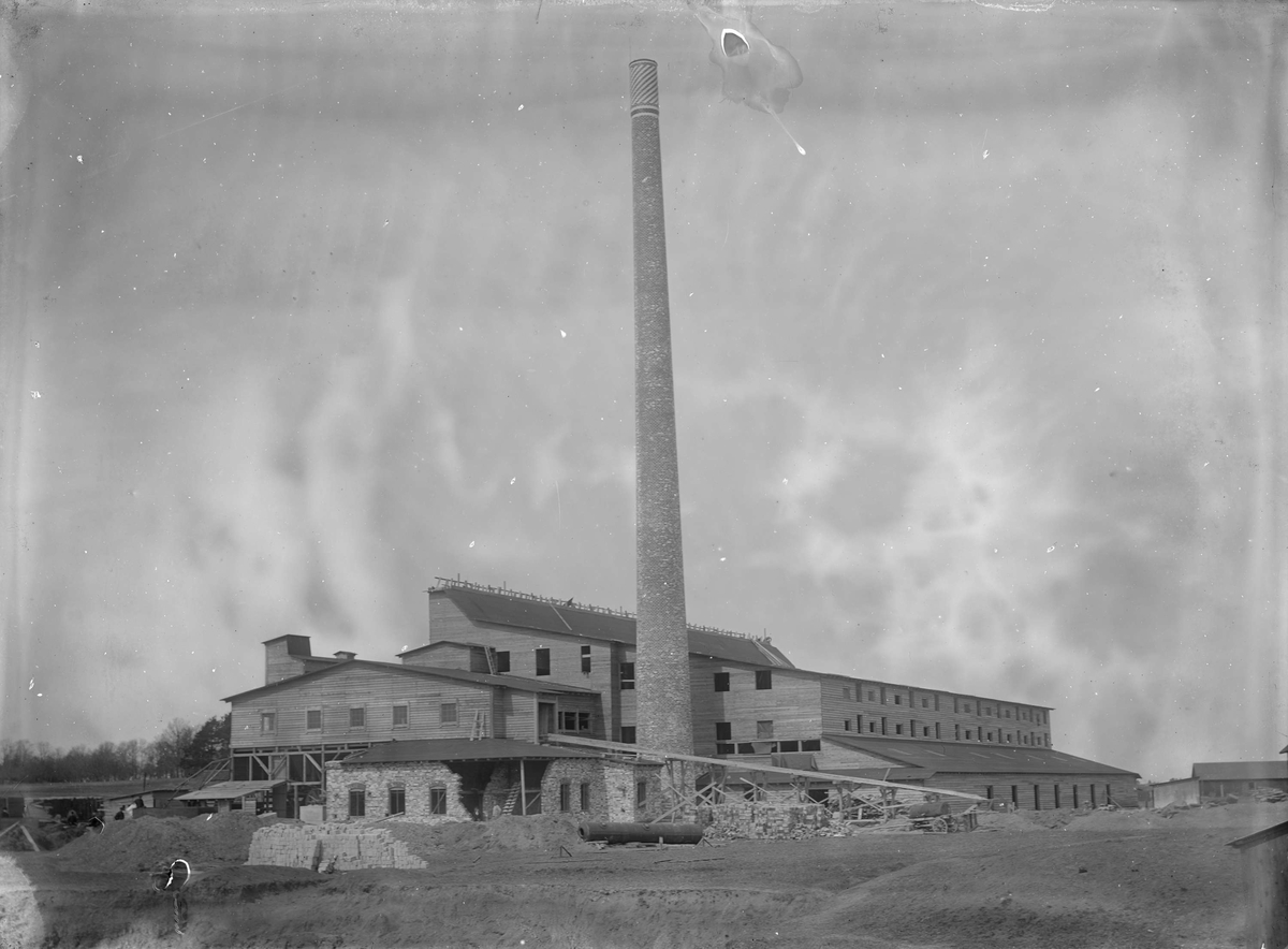 Henri Osti's Fotografiateliér, S:t Eriks Lervarufabrikers tegelbruk under uppförande, kvarteret Grenen, Luthagen, Uppsala 1909