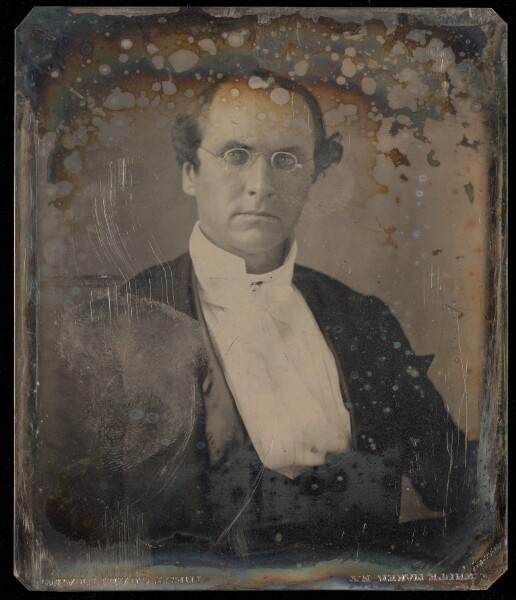 Unknown, [Portrait of a Seated Man Wearing Oval Wire-Rimmed Glasses]