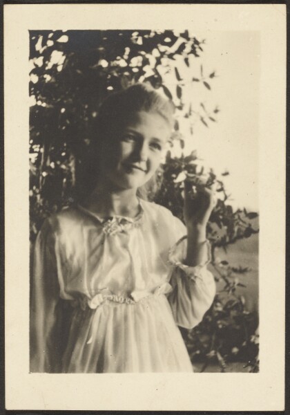 Louis Fleckenstein, [Young Woman Standing in Tree]