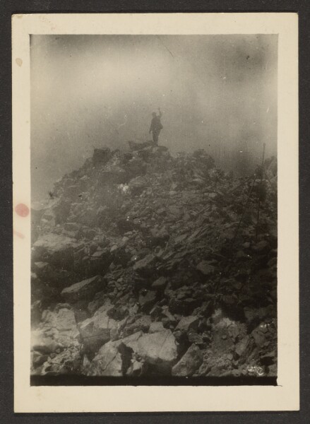 Louis Fleckenstein, [Man Atop Rock Pile]