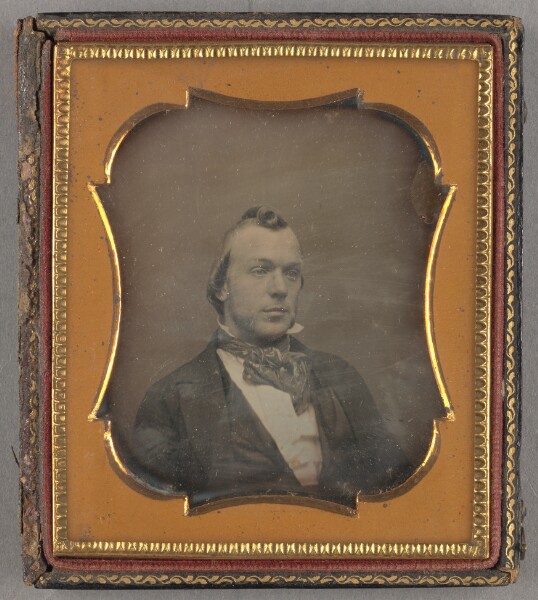 Unknown, [Portrait of a Seated Man with Single Curl at Top of Head]
