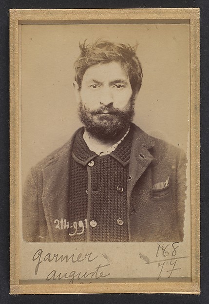 Alphonse Bertillon, Garnier. Auguste. 34 ans, né à Périgny (Côte-d'Or). Journalier. Anarchiste. 2/3/94.