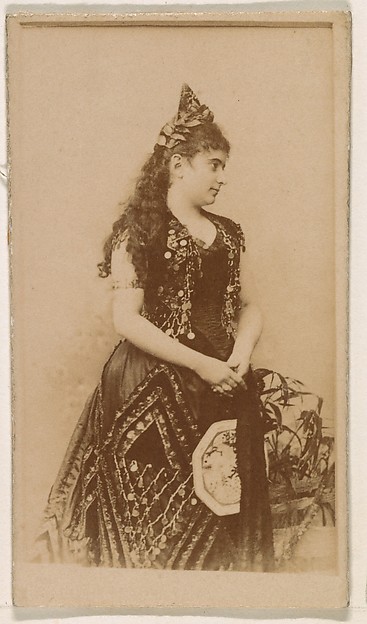 Kinney Brothers Tobacco Company, Actress in long dark gown, from the Actresses series (N245) issued by Kinney Brothers to promote Sweet Caporal Cigarettes
