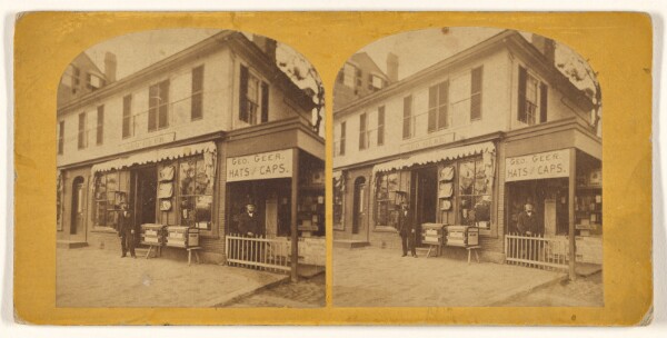 Unknown, [Exterior view of Geo. Geer Hats and Caps store]