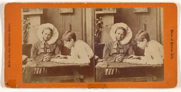 Unknown, [German woman and boy reading at table.]