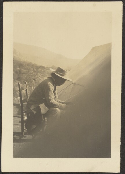 Louis Fleckenstein, [Man by Tent]