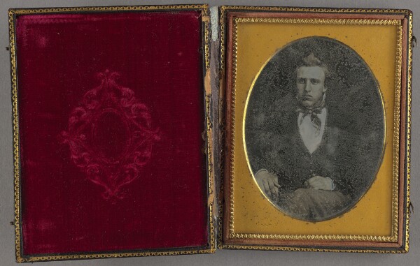 Unknown, [Portrait of a Seated Young Man with Pompadour Hair Style]