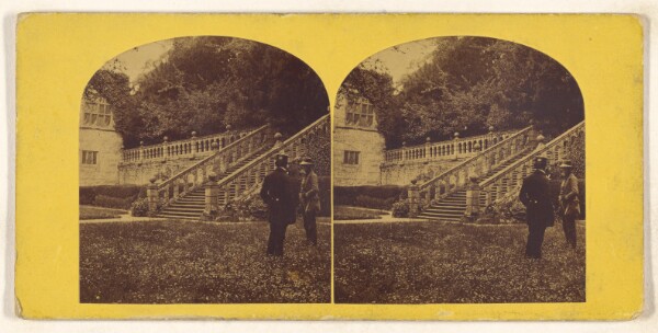 Unknown, [Two men talking on grounds of large British estate]