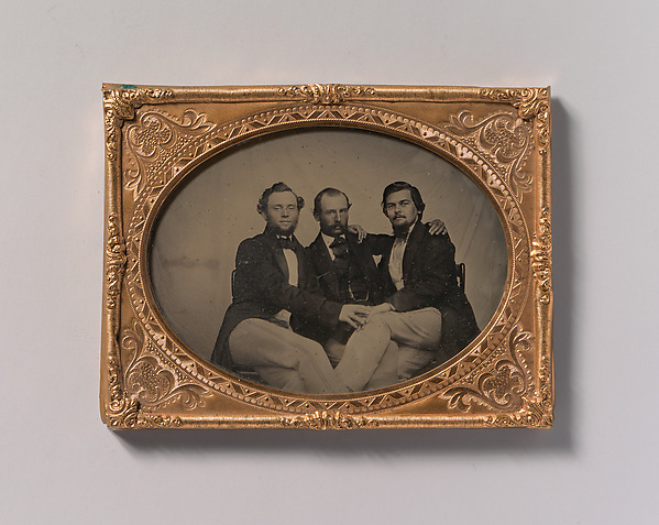 Unknown, [Three Seated Men with Arms Around Each Other]