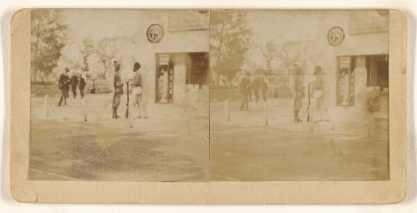 Unknown, [Soldiers at an unidentified town]