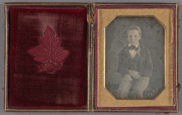 Unknown, [Portrait of a well-dressed young boy, seated]
