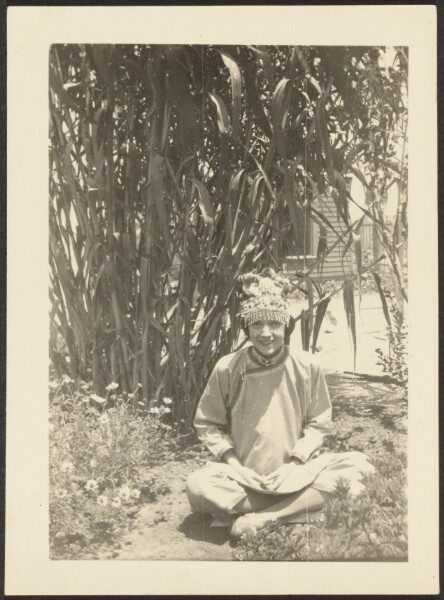 Louis Fleckenstein, [Woman in Costume Sitting in Garden]